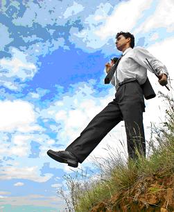 Managing risk in a stock trade is illustrated by a photo of a man stepping off of a cliff.